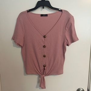 Pink short sleeve shirt with buttons and knot